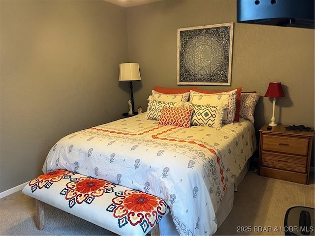 carpeted bedroom with baseboards