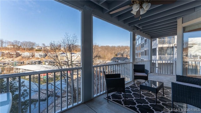 balcony featuring ceiling fan