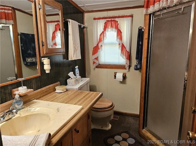 33 Zebco Ct, Edwards, MO 65326 - bathroom with visible vents, toilet, an enclosed shower, and vanity