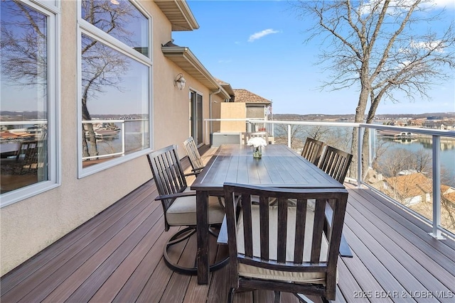 145 Bella Terra Ct, Sunrise Beach, MO 65079 - wooden terrace with outdoor dining area and a water view