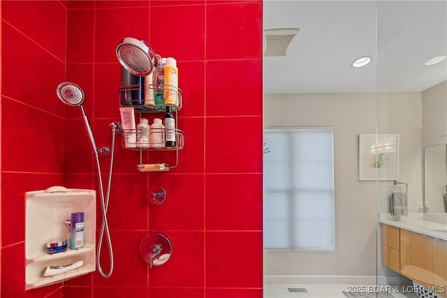 145 Bella Terra Ct, Sunrise Beach, MO 65079 - bathroom featuring a tile shower, visible vents, and vanity
