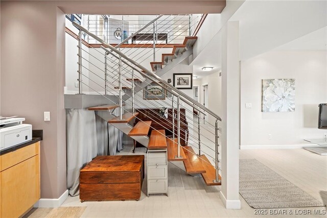 145 Bella Terra Ct, Sunrise Beach, MO 65079 - stairway with baseboards