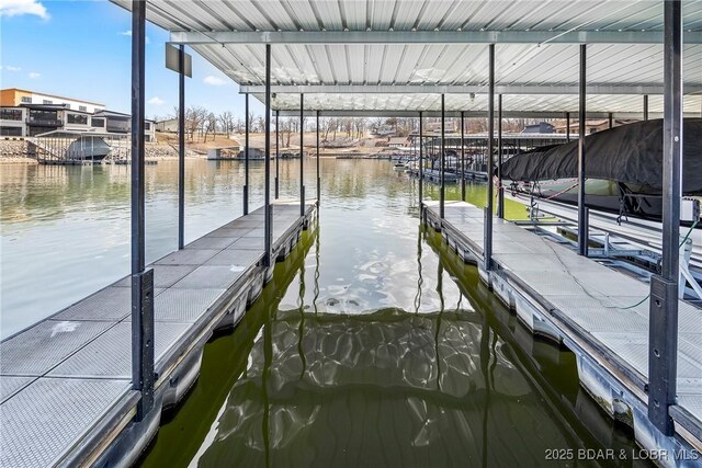 145 Bella Terra Ct, Sunrise Beach, MO 65079 - dock area with boat lift and a water view