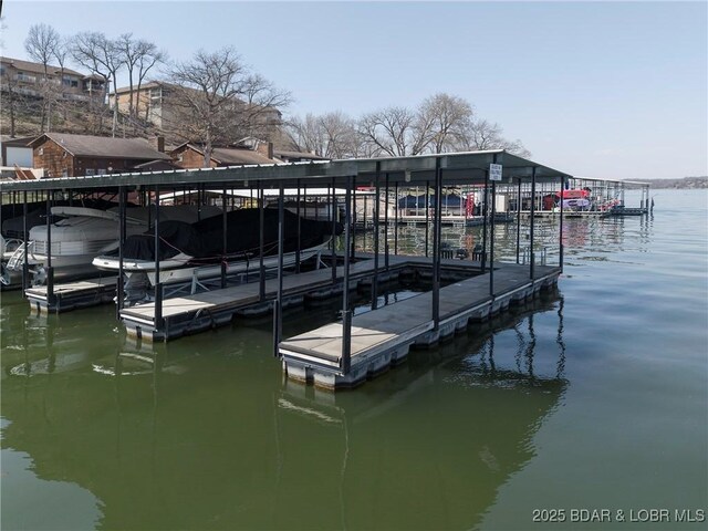 145 Bella Terra Ct, Sunrise Beach, MO 65079 - view of dock with boat lift and a water view