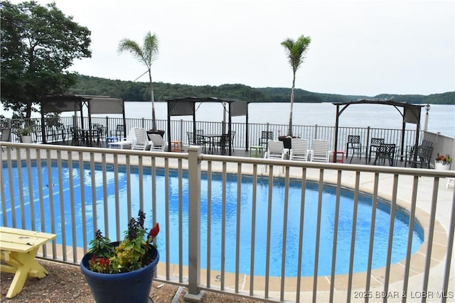 889 Malibu Rd Unit 91, Osage Beach, MO 65065 - community pool featuring a patio area and a water view