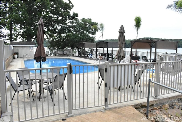 889 Malibu Rd Unit 91, Osage Beach, MO 65065 - community pool with a fenced backyard, outdoor dining space, and a patio