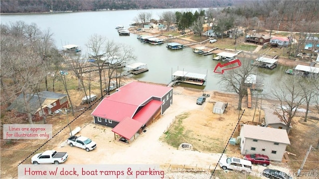 birds eye view of property featuring a water view