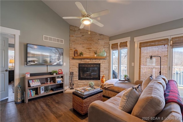 2813 Great Lake View Dr, Gravois Mills, MO 65037 - living room with ceiling fan, plenty of natural light, dark wood-style flooring, a fireplace, and high vaulted ceiling