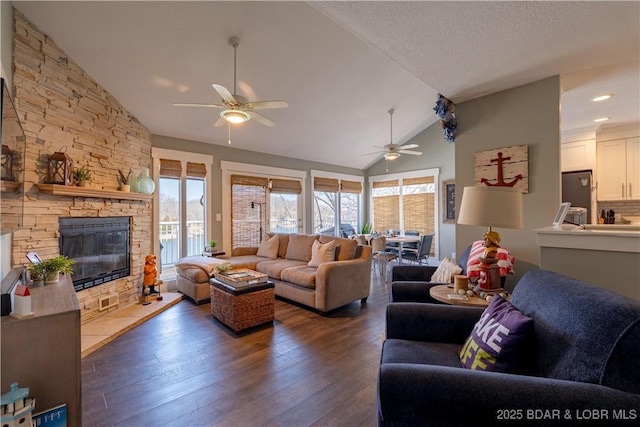 2813 Great Lake View Dr, Gravois Mills, MO 65037 - living area featuring ceiling fan, hardwood / wood-style floors, a fireplace, and high vaulted ceiling