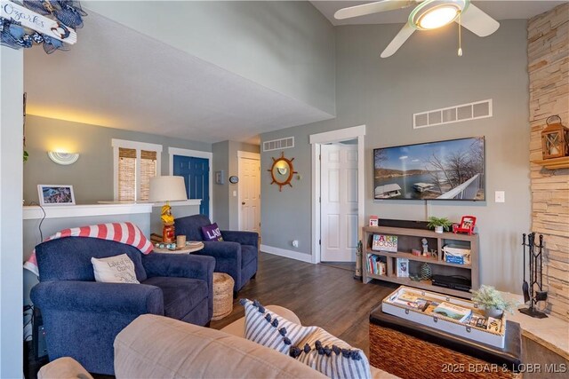 2813 Great Lake View Dr, Gravois Mills, MO 65037 - living room featuring wood finished floors, a ceiling fan, and a towering ceiling