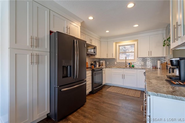 2813 Great Lake View Dr, Gravois Mills, MO 65037 - kitchen featuring black appliances, white cabinetry, tasteful backsplash, dark wood-style floors, and stone counters
