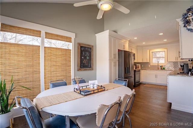 2813 Great Lake View Dr, Gravois Mills, MO 65037 - dining room with a ceiling fan, dark wood finished floors, recessed lighting, and a towering ceiling
