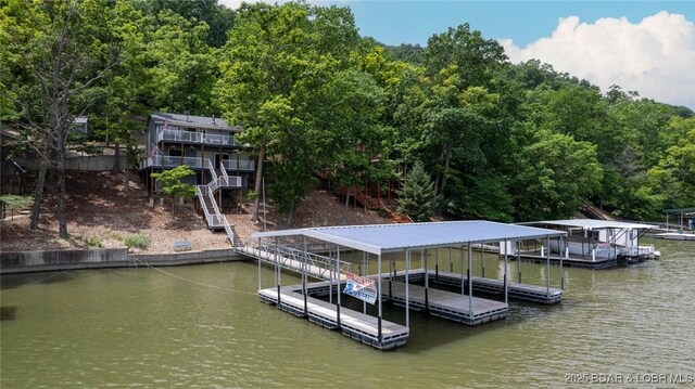 2813 Great Lake View Dr, Gravois Mills, MO 65037 - dock featuring a water view, stairs, and boat lift
