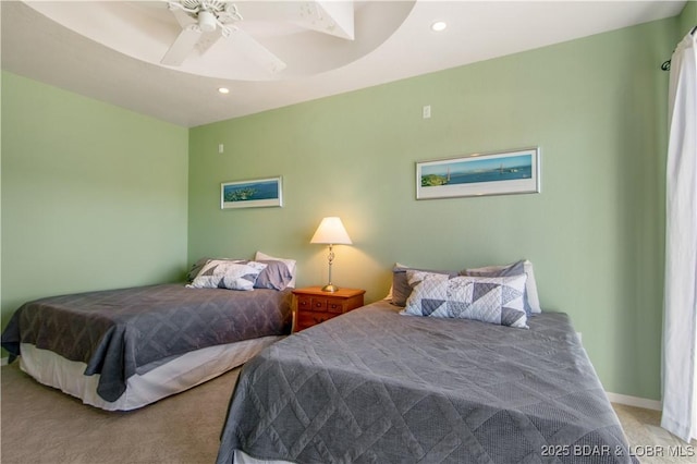 carpeted bedroom featuring a ceiling fan, recessed lighting, and baseboards