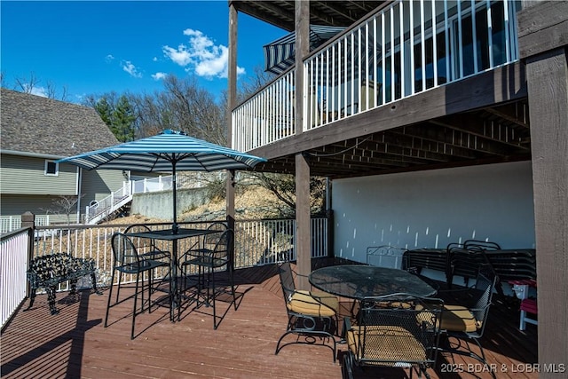 deck featuring outdoor dining space