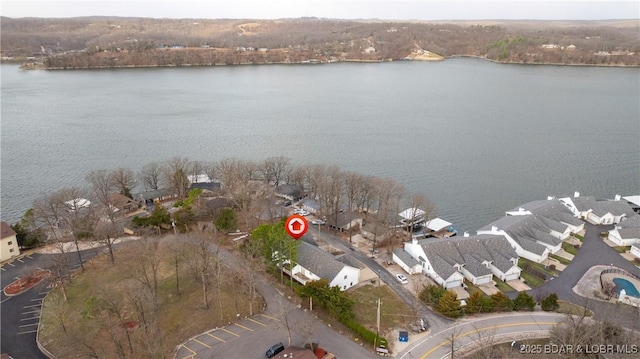 bird's eye view with a water view and a residential view