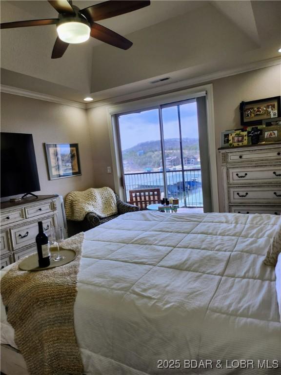 201 Marina Residence Dr Unit 3C, Camdenton, MO 65020 - bedroom featuring access to outside, ceiling fan, lofted ceiling, and ornamental molding