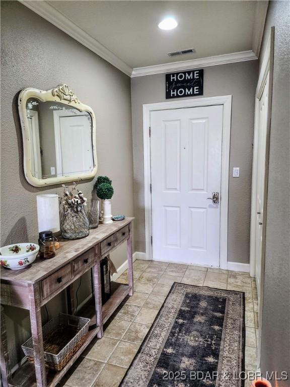 201 Marina Residence Dr Unit 3C, Camdenton, MO 65020 - entrance foyer featuring crown molding and baseboards
