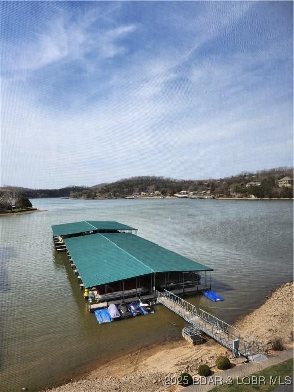 201 Marina Residence Dr Unit 3C, Camdenton, MO 65020 - dock featuring a water view