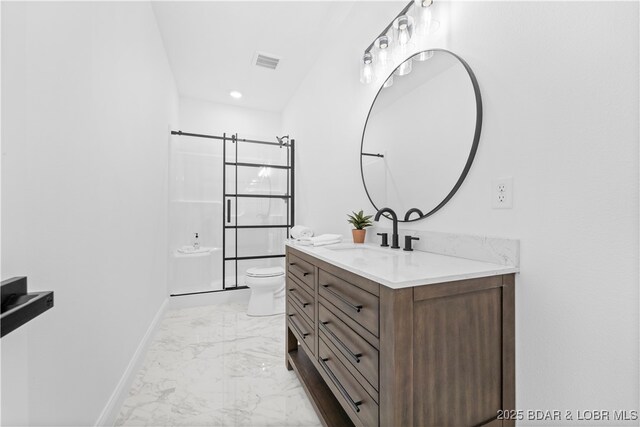 full bath featuring baseboards, marble look tile flooring, toilet, vanity, and a shower