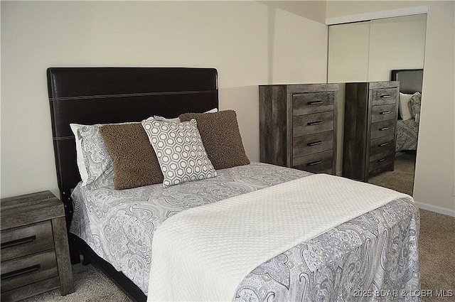 207 Circle Edge Unit 1A, Lake Ozark, MO 65049 - carpeted bedroom with a closet and baseboards