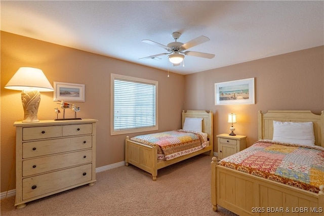 bedroom featuring light carpet, a ceiling fan, and baseboards