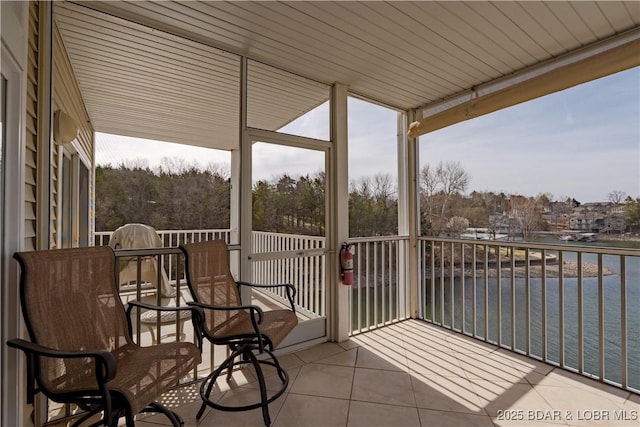 balcony featuring a water view