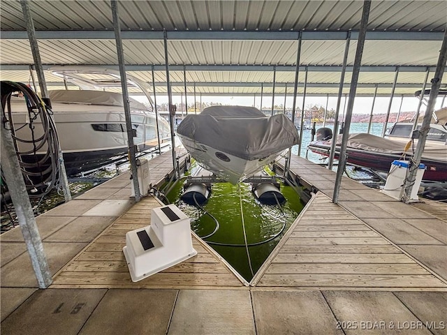 view of dock with boat lift