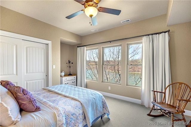 189 Black Rock Rd, Camdenton, MO 65020 - bedroom featuring light carpet, a closet, and ceiling fan