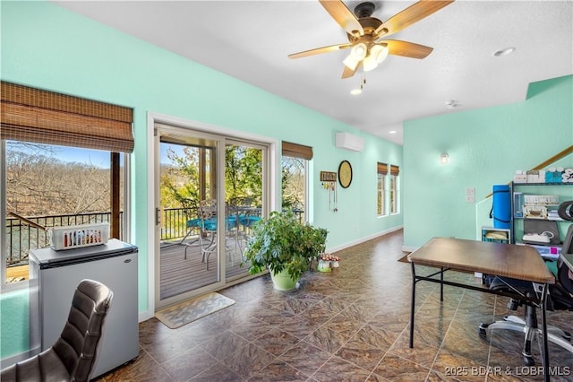 office area featuring ceiling fan, baseboards, a wall mounted AC, and recessed lighting