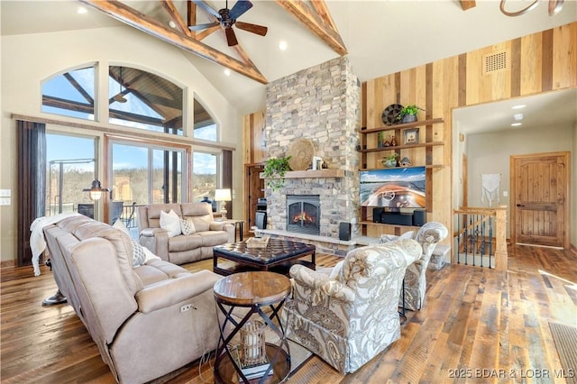 189 Black Rock Rd, Camdenton, MO 65020 - living area with high vaulted ceiling, ceiling fan, beamed ceiling, wood-type flooring, and a fireplace