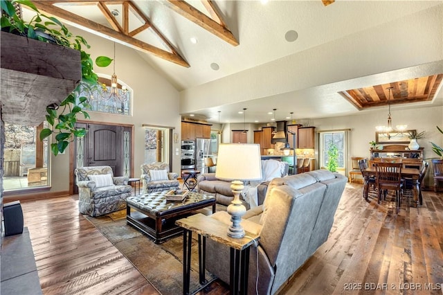 189 Black Rock Rd, Camdenton, MO 65020 - living area featuring a chandelier, hardwood / wood-style flooring, high vaulted ceiling, and beamed ceiling