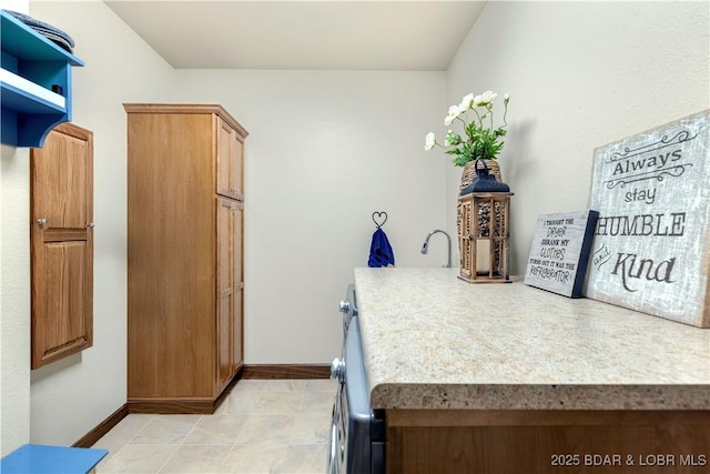 189 Black Rock Rd, Camdenton, MO 65020 - washroom featuring washer and dryer and cabinet space