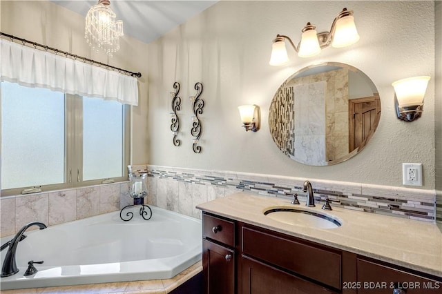 189 Black Rock Rd, Camdenton, MO 65020 - full bath with vanity, a bath, and tasteful backsplash