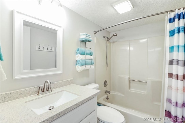 bathroom featuring vanity, shower / tub combo with curtain, a textured ceiling, and toilet
