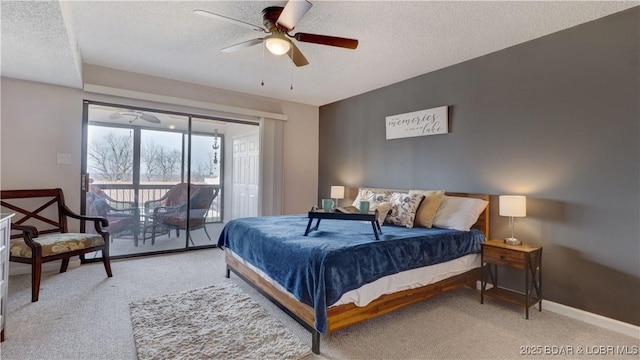 bedroom featuring access to outside, a textured ceiling, and light carpet