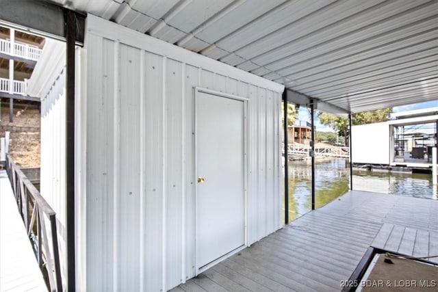 dock area with a water view