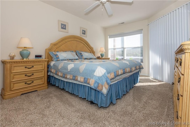 686 Clearwater Dr Unit 1E, Camdenton, MO 65020 - carpeted bedroom featuring a ceiling fan
