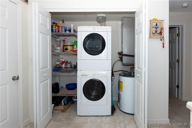 686 Clearwater Dr Unit 1E, Camdenton, MO 65020 - washroom with stacked washing machine and dryer and water heater