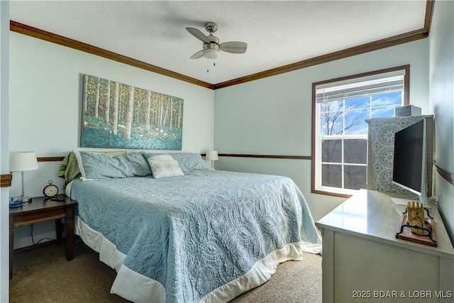 carpeted bedroom with ornamental molding, a textured ceiling, and a ceiling fan