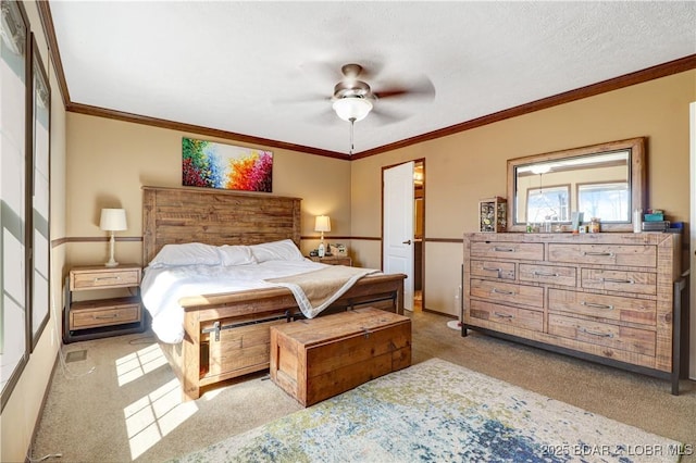 bedroom featuring ornamental molding and carpet