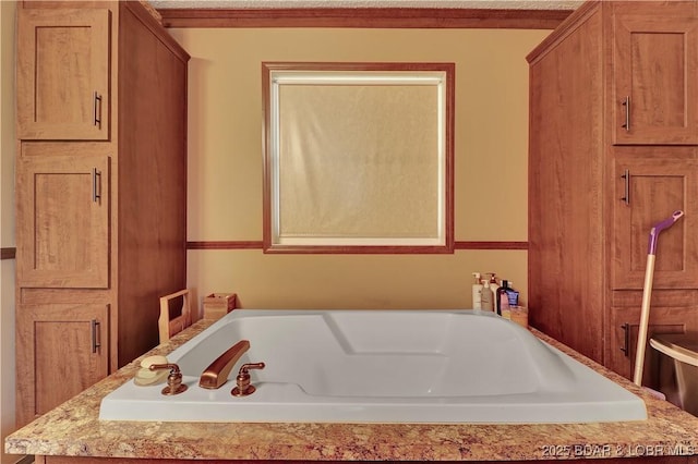 bathroom featuring a bath