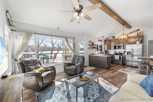 27570 Golden Point Ln, Barnett, MO 65011 - living room with a ceiling fan, dark wood-type flooring, and a chandelier