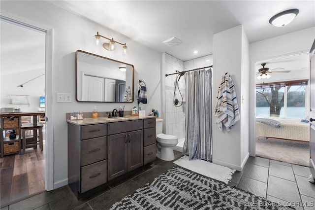 27570 Golden Point Ln, Barnett, MO 65011 - bathroom featuring ensuite bathroom, ceiling fan, vanity, tiled shower, and recessed lighting