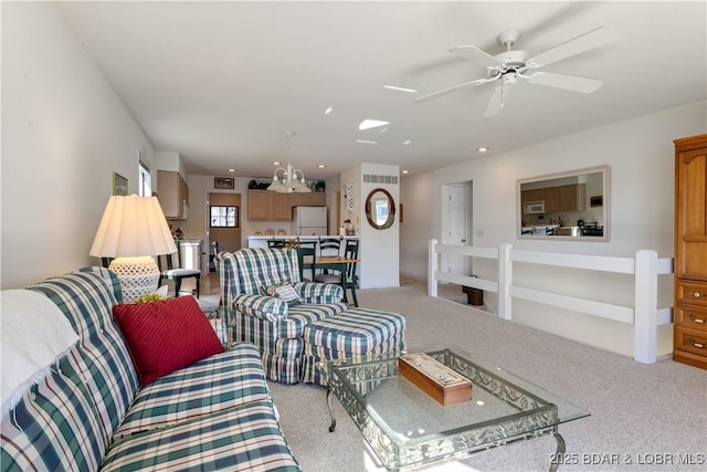 262 Bluff Blvd Unit 1B, Camdenton, MO 65020 - living room with light colored carpet, recessed lighting, and a ceiling fan