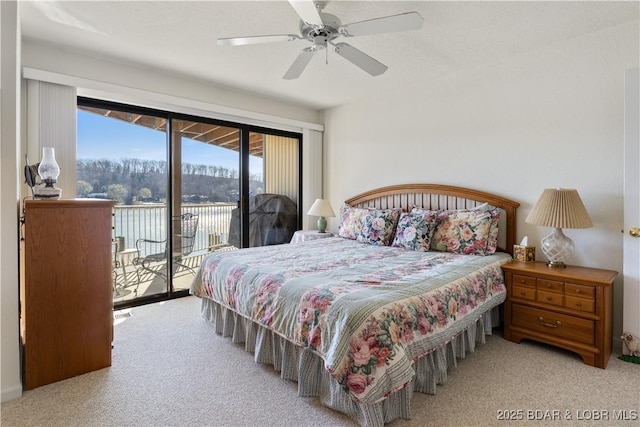 262 Bluff Blvd Unit 1B, Camdenton, MO 65020 - carpeted bedroom with access to exterior and ceiling fan