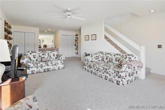 262 Bluff Blvd Unit 1B, Camdenton, MO 65020 - carpeted living area with stairs, ceiling fan, and recessed lighting
