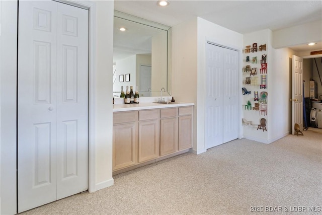 262 Bluff Blvd Unit 1B, Camdenton, MO 65020 - bathroom featuring carpet floors and a closet