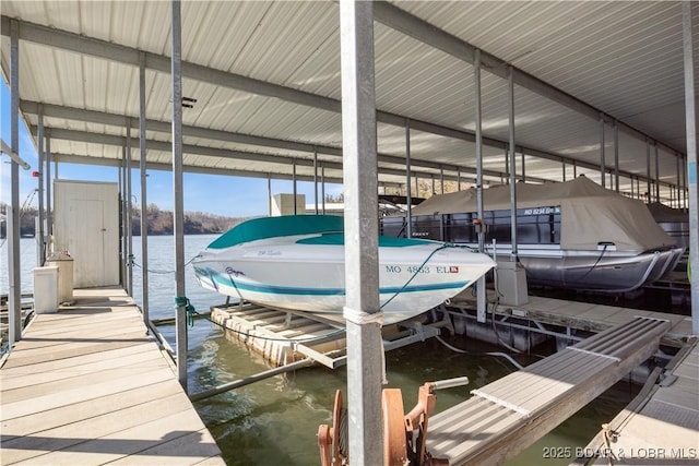 262 Bluff Blvd Unit 1B, Camdenton, MO 65020 - dock area with a water view and boat lift