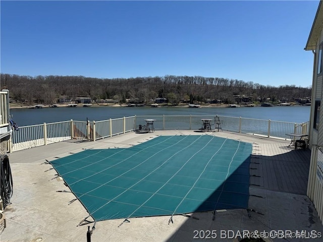 262 Bluff Blvd Unit 1B, Camdenton, MO 65020 - community pool featuring a water view and a patio